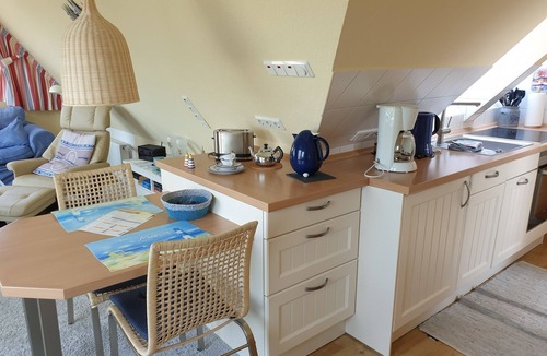 Norddeich Apartment | Cozy attic studio Norddeich panoramic window with sea view beach 50 meters