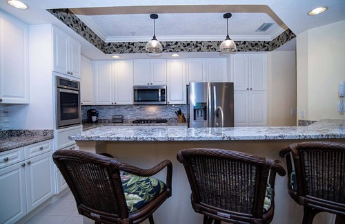 St. Augustine Condo | Direct Golf course View - screened lanai-sleeps 8 - pool-hot tub-near beaches