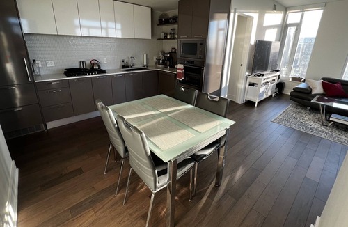 Connaught Condo | Home in the Sky 2 Bed 2 Bath Sunny Corner Unit