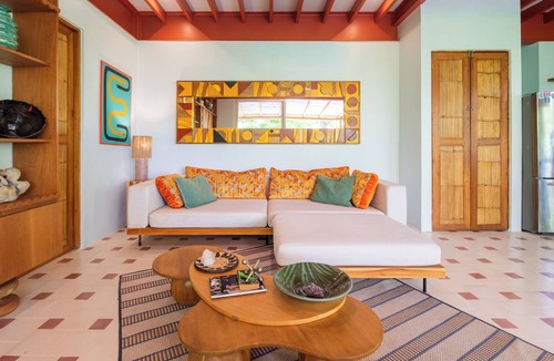 Playa Santa Teresa Apartment | In the gated community of Mar-A-Mar, walking distance from La Lora famous surf break and nicest white sand beach, the home counts with 3 bedrooms, 2 bathrooms, nice living room with open space kitchen & terraces. 24/7 security and shared pool.