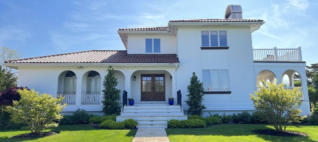 Charming Spanish villa with heated pool in West Hampton Beach in prime location in Westhampton Beach