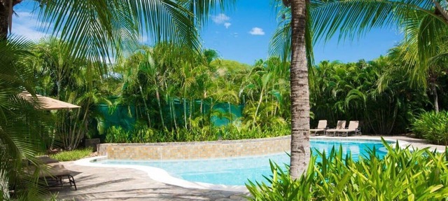 Colorful Poolside Condo w/Garden-View Patio & Resort-Style Amenities in Pacifico Blvd