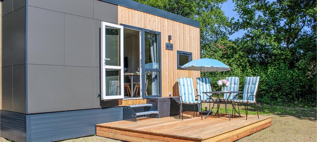 Experience a real Tiny House vacation close to nature at Camping Park Wemding! in Wemding