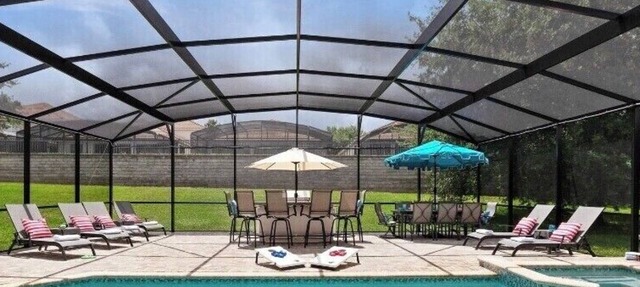 Magical 5 bedroom villa, extended pool deck and movie theatre room near Disney in Kissimmee