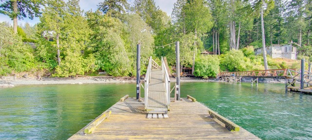 Oceanfront Getaway with Private Dock + Beach in Sooke