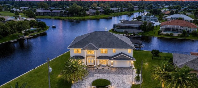 Pool and canal front home in Palm Coast! in Palm Coast