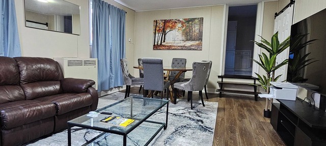 Spacious 4BR Retreat w/King Loft Near Downtown PTBO & Hospital + Parking in Peterborough