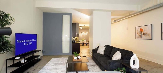 Luxe 2BR Loft Retreat: Private Terrace & Free Gym in Pittsburgh